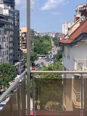 a view of a city street from a balcony at Lilia 5 Self-Check in apartment in Sofia