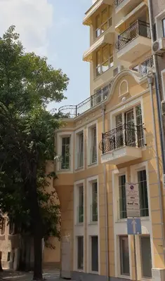 a building with a cross on the side of it at IFM Boutique studio in Plovdiv