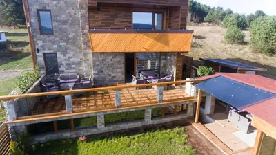 an aerial view of a house with a deck at RELAX Guest House in Tsigov Chark
