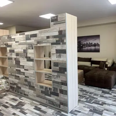 a living room with a wall made out of tiles at При Павката (Pri Pavkata) in Samokov