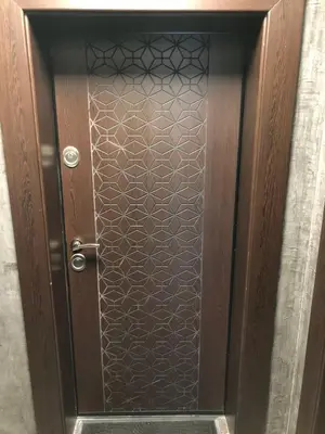 a wooden door with a glass door at При Павката (Pri Pavkata) in Samokov