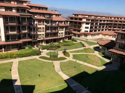 a view of a courtyard of an apartment building at Mountain View Apartment in Bansko
