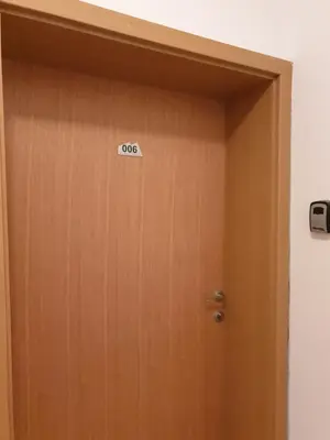 a door with azo sign on the side of it at Private Studio in Aspen Golf and Ski Resort in Razlog