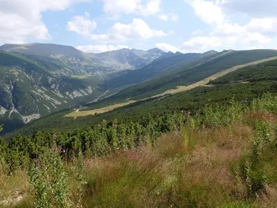 a view of a valley with mountains in the background at Borovets Apartments, Iglika 2 in Borovets