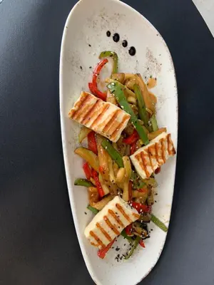 a white plate of food with pasta and vegetables at апартамент Мишел (Mishel) in Samokov