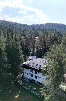 an aerial view of a building in the woods at Villa Ivan & Petar in Semkovo