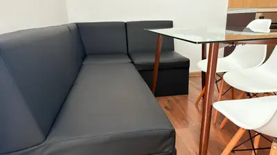 a couch in a room with a table at ASPEN GOLF RESORT Ski & Spa RELAX APARTMENT in Bansko
