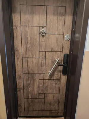 a wooden door with a lock on it at Iskra Apartment in Sofia