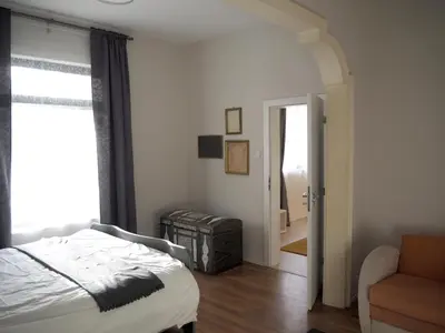 a bedroom with a bed and a window at Caché - Bright One-Bedroom Apartment in Sofia by Flat Mаnager in Sofia