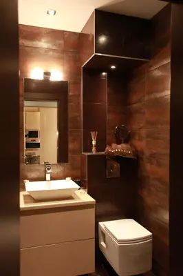 a bathroom with a sink and a toilet at Brown Cottage Apartment in Sofia