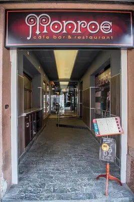 a store front of a store with a sign on it at Huge Stylish Apartment Monroe 1 / City Centre in Plovdiv