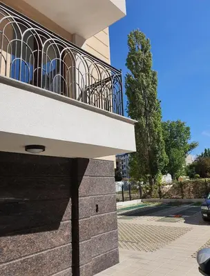 a balcony on the side of a building at VIP apartment & parking in Sofia