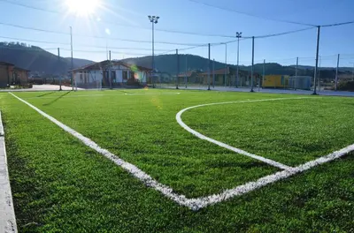 an empty soccer field with the sun shining on it at SPA Complex Belchin Spring in Belchin