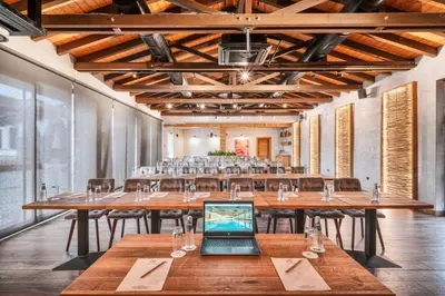 a large room with a large table with a laptop on it at SPA Complex Belchin Spring in Belchin