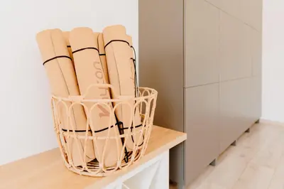 a basket of baseball bats sitting on a table in a kitchen at Magnificent apartment in the mountains in Banite