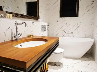 a bathroom with a sink and a toilet at Paradise Center Premium Suite 2 in Sofia