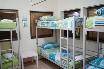 a bunk bed room with three bunk beds at Hostel Plovdiv in Plovdiv