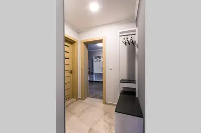 a kitchen with a sink and a stove at Elegance, City center, Kapana in Plovdiv