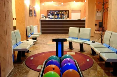 a waiting room with a game with balls in it at Private Apartment in Grand Monastery in Pamporovo