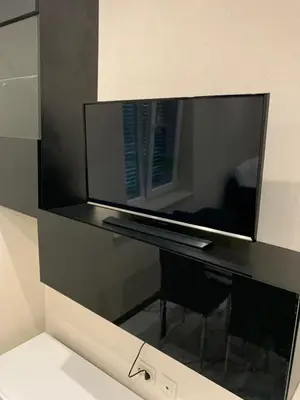 a reflection of a computer monitor on a desk at Патилови in Sandanski
