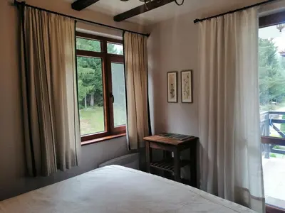 a bedroom with a bed and a window at 