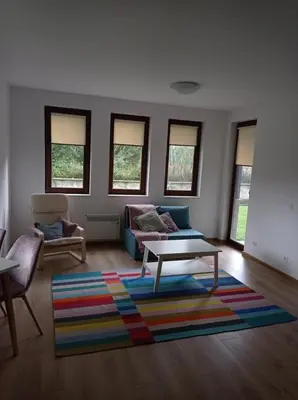 a living room with a couch and a coffee table at Комплекс Падалото 