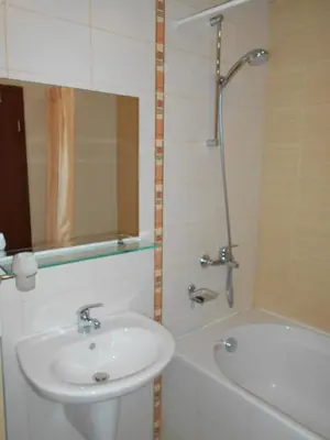 a bathroom with a sink and a shower and a tub at VALENTINA`S STUDIO in 