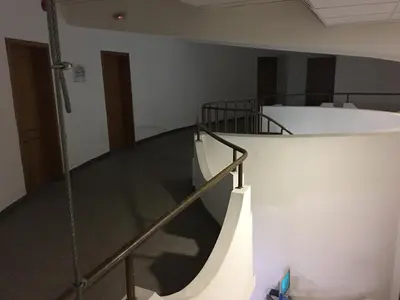 a staircase in a building with a glass floor at Hostel Elena in Sofia