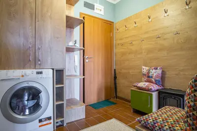 a laundry room with a washing machine in it at Gondola 1 BDRM Flat in Cedar Lodge IV (D2) in Bansko