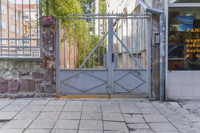 an entrance to a building with a metal gate at Cosy & renovated 2BD flat near Vitoshka by Flat Mаnager in Sofia