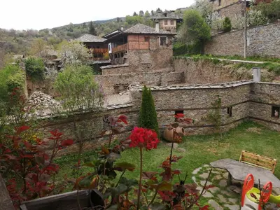 a view of a garden in an old building at Къща за гости Кануш войвода in Kovachevitsa