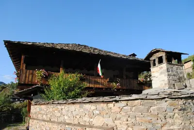 a house on top of a stone wall at Къща за гости Кануш войвода in Kovachevitsa