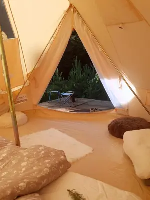 a tent with a view of the inside at Zarevo Glamping in Skobelevo