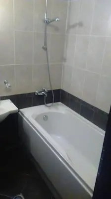 a white bath tub in a bathroom with a shower at Aspen heights studio 308 in Razlog