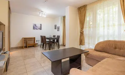 a living room with a couch and a table at 1BD apartment in a calm area near the centre by Flat Mаnager in Plovdiv