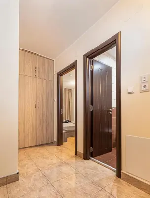 an empty room with two doors and a bathroom at 1BD apartment in a calm area near the centre by Flat Mаnager in Plovdiv