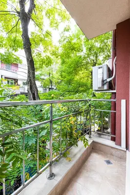 a balcony with a view of a tree at 1BD apartment in a calm area near the centre by Flat Mаnager in Plovdiv