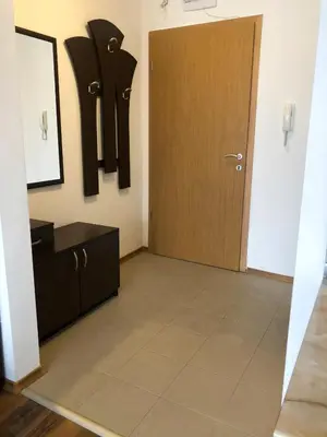 a room with a door and a tile floor at Nickmar Studio-Apartment in Bansko