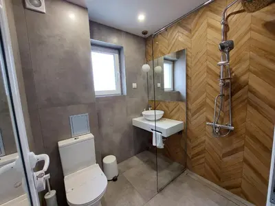 a bathroom with a toilet and a sink at 