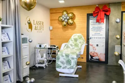 a waiting room with a chair and a sign at 