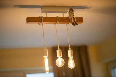 a group of lights hanging from a ceiling at Apartment City View 2 in Sofia