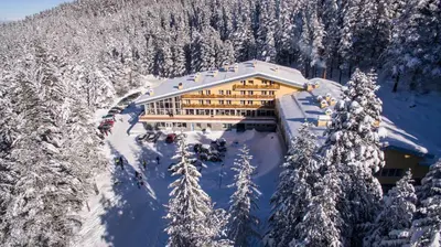 an aerial view of a ski lodge in the snow at Hotel Malyovitsa in Govedartsi