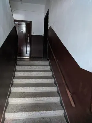 a staircase leading up to a door in a building at Midtown Place Apartment DORIS 1 with garage in Plovdiv