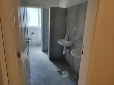 a bathroom with a sink and a mirror at Hostel Iliana Общежитие Илияна in Elin Pelin
