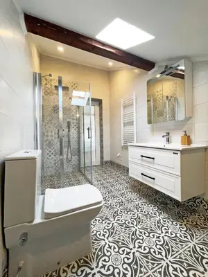 a bathroom with a shower and a toilet and a sink at Stylish loft studio with great view to Ardino in Ardino