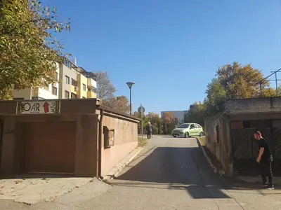a man standing on the side of a street at New Apartment at a Great Location in Blagoevgrad