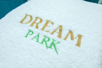 a white towel with the word urban park written on it at Dream Park Apartment in Sandanski