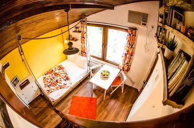 an overhead view of a room with a bed and a window at Off Vitosha Blvd Designer Studio in Sofia