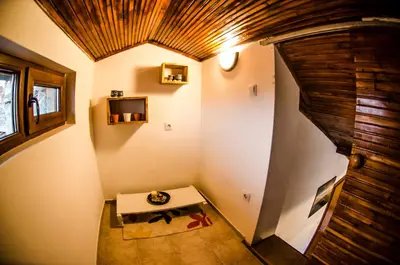 a room with a table in the corner of a room at Off Vitosha Blvd Designer Studio in Sofia