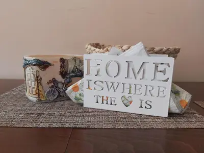 a home is where the is sign next to two baskets at Apartment Krasi in Velingrad